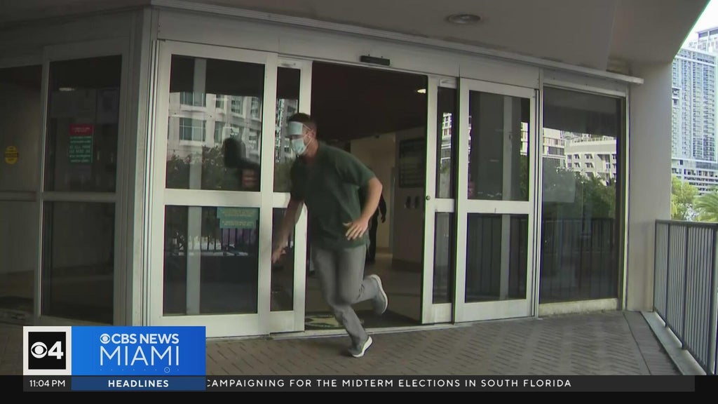 Ex-Lauderhill cop arrested for impersonating dead man runs away from cameras after release — CBS Miami, Jupiter Community news