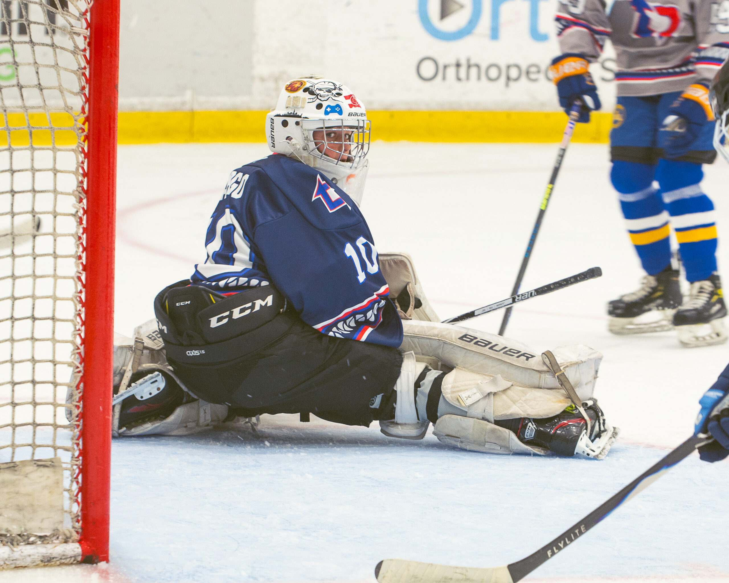 Helping through hockey — Florida Weekly, Jupiter Technology news